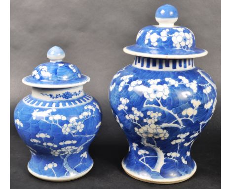 A graduating pair of 19th Century Chinese Oriental Qing Dynasty Kangxi revival blue and white porcelain ginger jars / vases w