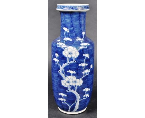 A 19th Century Chinese Oriental Qing Dynasty Kangxi revival blue and white porcelain vase. The vase of rouleau shape having h