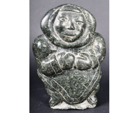 Believed Paulosie Kasudluak - An Inuit art hand carved soapstone figurine depicting a male figure believed to be by Paulosie 