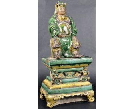 A 16th Century Ming Dynasty Chinese / Oriental Sancai / spinach & egg glaze ceramic figure of Guandi & stand. Guandi the God 