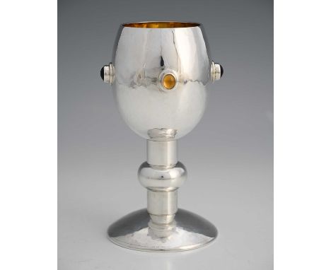 (†) Graham Leishman Stewart (British 1955-2020).A modern silver goblet, with gilt interior, the planished bowl section adorne