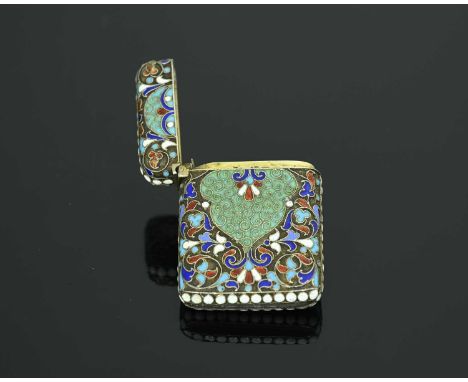 A twentieth-century silver-gilt-coloured metal and enamel vesta case, of rounded rectangular form, the body with cloisonne en