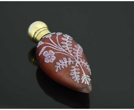 A Victorian cameo glass and silver-gilt mounted scent bottle or perfume bottle, the body with opal over ruby red, depicting f