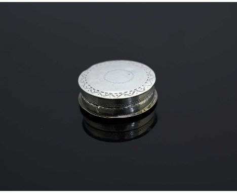 A late eighteenth or early nineteenth-century silver patch box, apparently unmarked, of rounded form, the top and bottom both