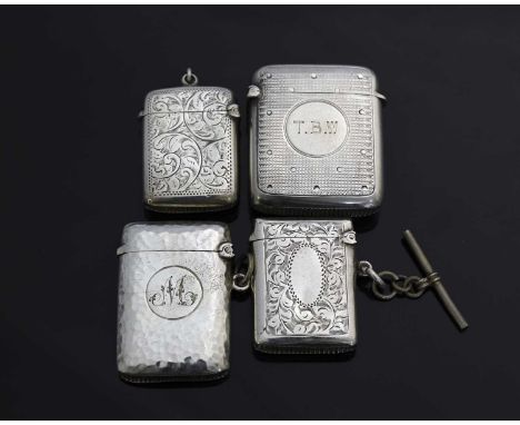 Four twentieth-century hallmarked silver vesta cases, to include one Edwardian silver example, of rounded rectangular form, t