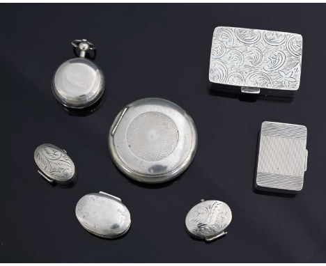 A George V silver compact, of globular form, the cover decorated with a panel of engine-turning, the hinged cover opening to 
