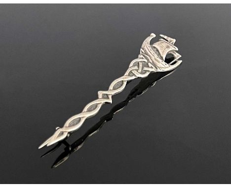 Alexander Ritchie.A George V Arts and Crafts Scottish silver Iona brooch, of Celtic sword form, the finial cast with a ship i