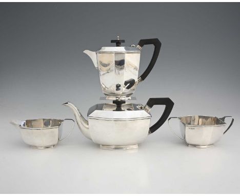 A George V silver Art Deco four-piece tea and coffee service, comprising coffee pot, teapot, two-handled sugar bowl and milk 