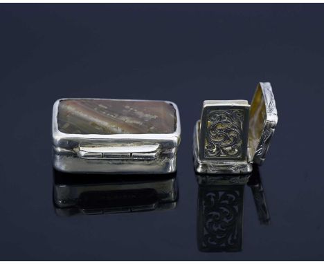 A Victorian silver vinaigrette, of rectangular form, the exterior decorated with foliate scrolls, George Unite, Birmingham 18