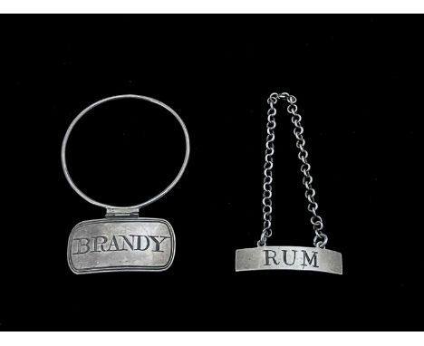 Two George III silver wine labels or bottle tickets, to include a rectangular provincial example, with belcher chain, incised