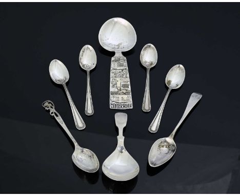 An Elizabeth II silver caddy spoon, Francis Howard Ltd., Sheffield 1977, together with six hallmarked silver teaspoons and a 