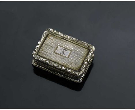 An early Victorian silver vinaigrette, of rectangular form, the exterior decorated with engine-turning and cast foliate scrol