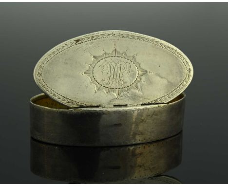 A George III silver snuff box, of navette form, the exterior decorated with bright-cutting and central cartouche with starbur