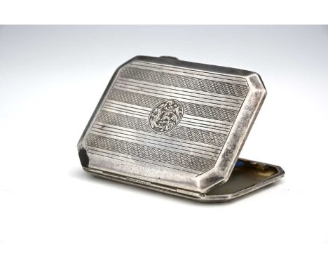 A George VI silver cigarette case, of rectangular form with canted corners, the exterior decorated with engine turning, Frede