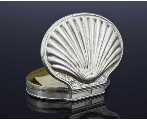 An early eighteenth-century silver snuff box, of shaved oval form, the hinged cover embossed to resemble a scallop shell, eng