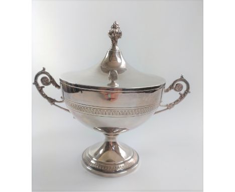 A silver two handled cup and cover. 
