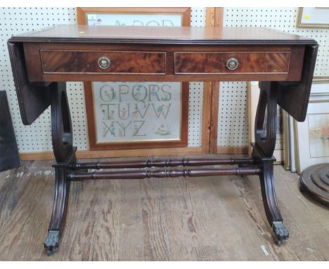 A Mahogany Sofa Table 20th century. 75cm x 95cm (145cm wide fully extended) x 51cm 