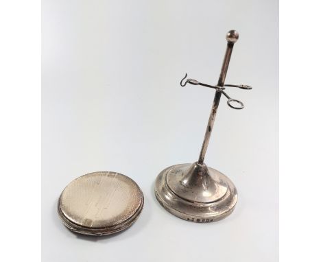 A silver tie-pin holder and a lady's silver compact, but no hallmark. 