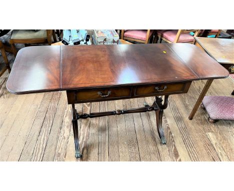 A reproduction Mahogany Sofa Table. 20th century. Fitted with two drawers. 74 x 139 x 55cm 