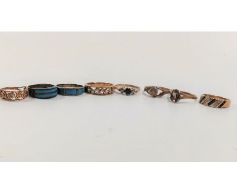 A collection of eight rings with both gold and silver, gem set. Size K-L 