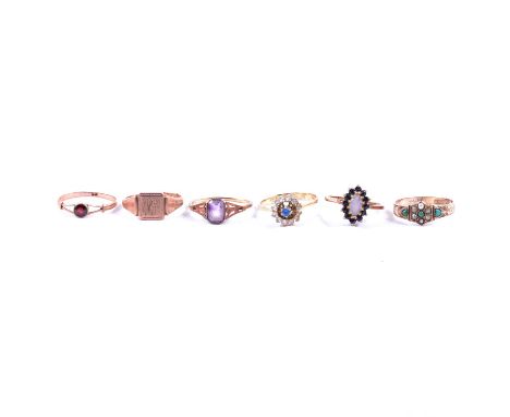 Six gold / yellow metal rings, three lockets, two chains and a wristwatch, an opal and sapphire cluster ring, the marquise ca