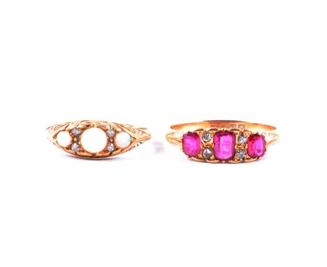 Two half hoop rings, opal and diamond, ruby and diamond, an opal and diamond half hoop ring, the three graduated round caboch