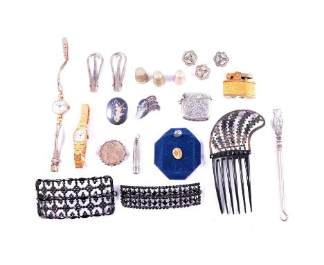 A papier mache glove box with vintage hair combs, two Siam niello brooches, thimbles, a lady's roamer wristwatch with 9 carat