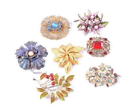 A collection of costume jewellery brooches, to include floral designs; bird in flight; squirrel with acorns; cameos; paste se