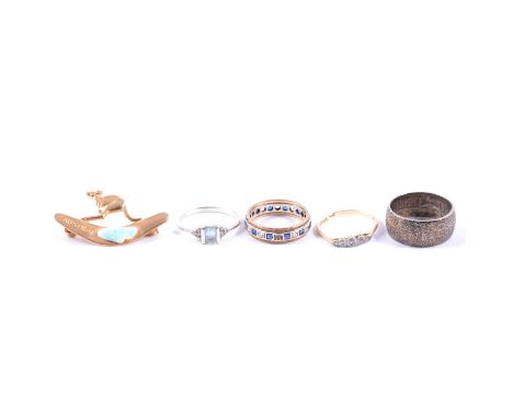 Three gemset rings, a silver coin ring, and a souvenir brooch, a diamond five stone ring, the five 8 cut and rose cut stones 