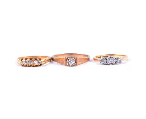 Three diamond set rings, a Victorian style ring set with five graduated old cut diamonds in an all yellow metal mount ring si
