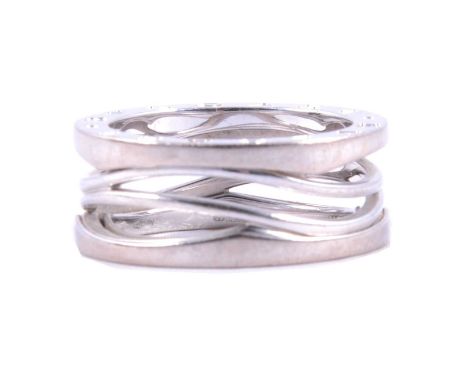 Bulgari - a B.zero 1 ring designed by Zaha Hadid, 9.1mm gauge openwork fluid design in 18 carat white gold, signed Bvgari to 