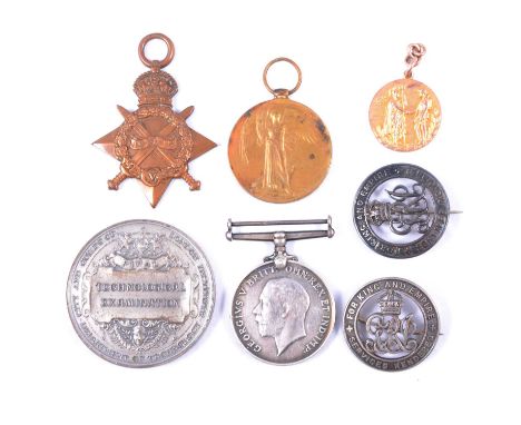 A yellow metal medallion, WW1 medals, badges and First Prize Medal, a yellow metal N.U.O Free Gardeners Wolverhampton Distric