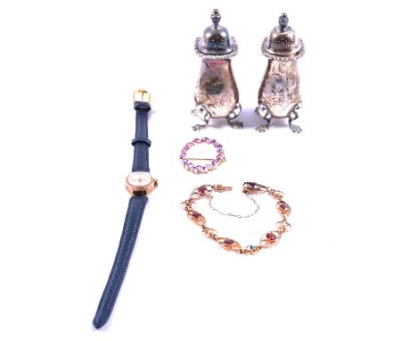 An amethyst and diamond brooch, garnet and pearl bracelet, gold wristwatch and silver condiments, an amethyst and diamond 27m