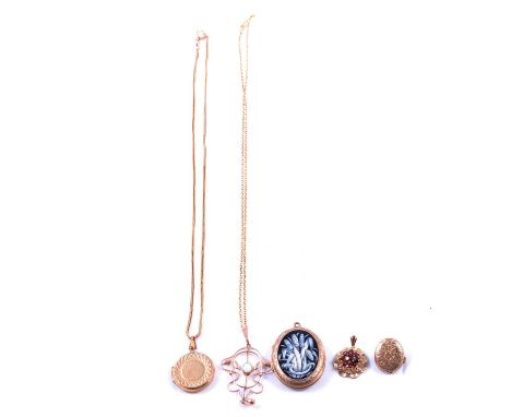 An Edwardian opal pendant, garnet pendant, lockets and chains, an Edwardian opal pendant, the oval cabochon cut opal collet s