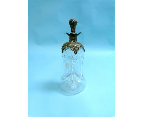 A late Victorian silver mounted glass Decanter, of spiral fluted waisted form, the shoulders and neck mounted in silver with 