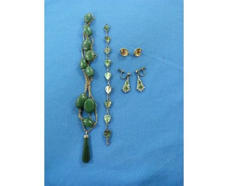 A long gilt metal Chain, set with nine green stone beads and with New Zealand green jade drop mounted in 9ct yellow gold, tog