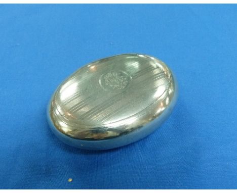 A George V silver Tobacco Box, by William Neale, hallmarked Birmingham, 1913, of squat oval form with squeeze opening action,