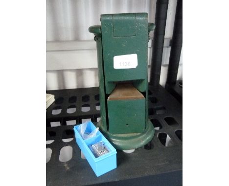 A Waterlow & Sons ticket printing machine, circa 1920-1940, with brass plaque, No.M8895, London, finished in green, 9in (23cm
