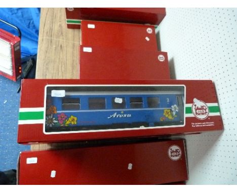 A Lehmann LGB G scale 30900 Rhatische Bahn Arosa Power Car, Bt 1703, boxed, and three 37674 blue Arosa passenger coaches, B 2