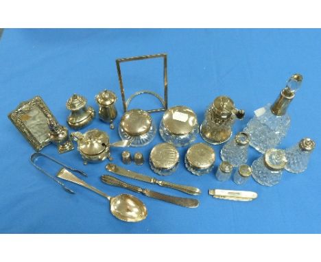 A quantity of small silver pieces, including silver-mounted thistle-shaped pepper grinder, eight various cruet pieces, five v