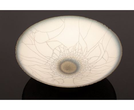 David White (Contemporary-2011), a ceramic footed raku dish with uneven rim, blue and grey rings, impressed potter's mark to 