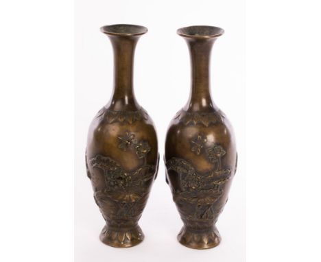 A pair of Chinese bronze vases, 20th Century, decorated on the body with a relief of swimming fish and flying dragonflies amo