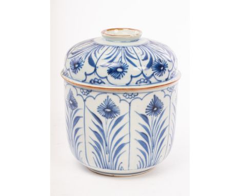A blue and white jar and cover, Qing dynasty, Kangxi period, painted with vertical panels of sunflowers, 14.5cm high/Provenan