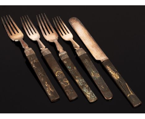 A group of five Japanese bronze-handled flatware, comprising four forks and one knife, marked JS&amp;S*, largest 21cm long CO