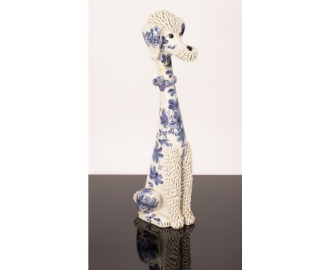 An Italian ceramic spaghetti poodle, of elongated proportions, decorated blue floral detail and textured ceramic fur, 58cm hi