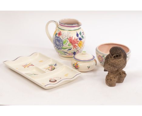 Poole Pottery, five pieces comprising a figure of an owl, signed B Linley-Adams, 17.5cm, an hors d'oeuvre dish, 34cm wide, a 