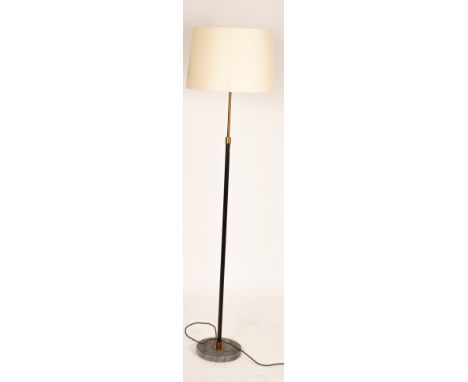 A standard lamp of modern design, grey veined marble base and cream shade, 167cm high/Provenance: From a Flora Soames interio