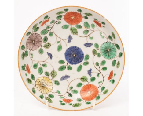 A Chinese famille vert plate, Kangxi, with floral decoration, base marked with a blue square, 17cm diameter CONDITION REPORT: