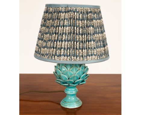 A modern blue ceramic lamp in the form of an artichoke, 32cm without shade, 50cm with blue and white fabric shade/Provenance: