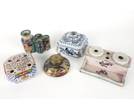 a Middle Eastern, ceramic inkwell and four antique French ceramic inkwells, each with a polychrome decor || Lot (5) van een M